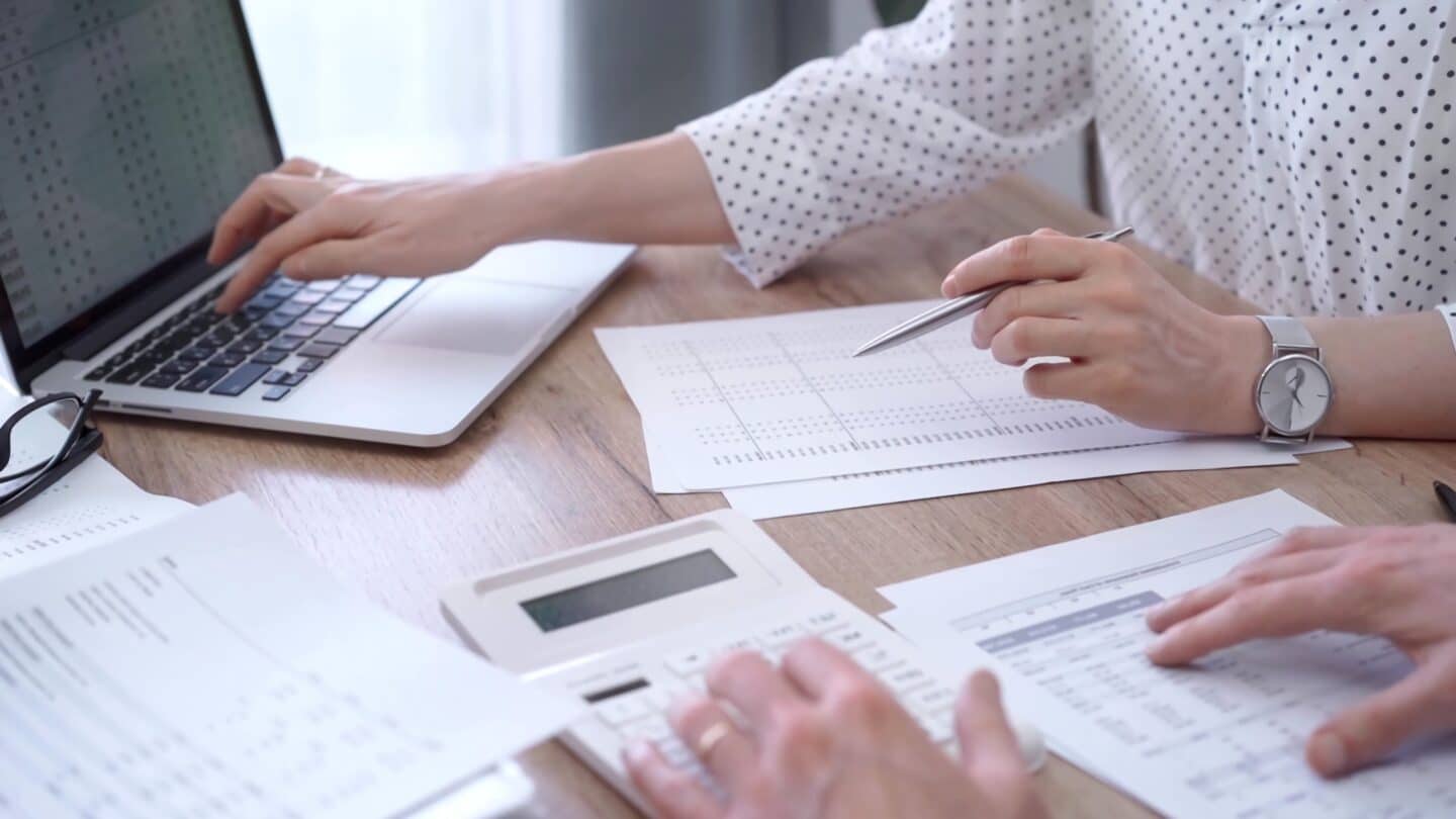 Accountants Reviewing Financial Reports Together