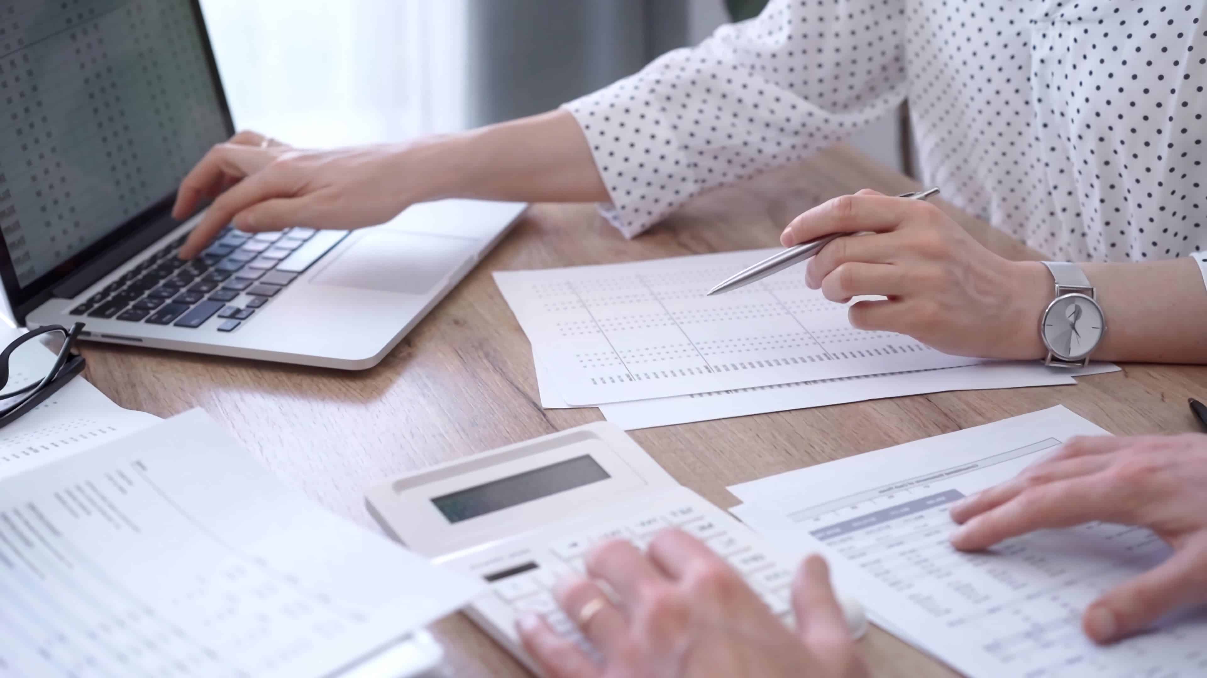 Accountants Reviewing Financial Reports Together